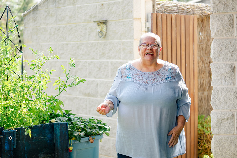 Happy woman gardening