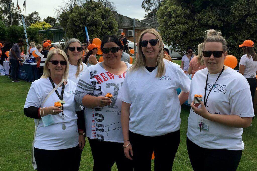 five women standing at fundraiser